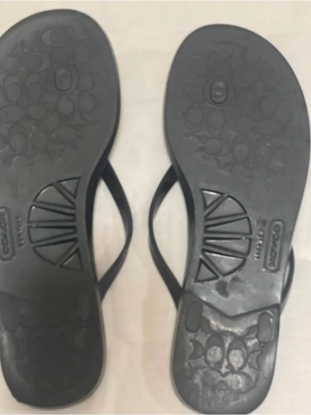 Coach Black and Gold Bow Jelly Flip Sandals